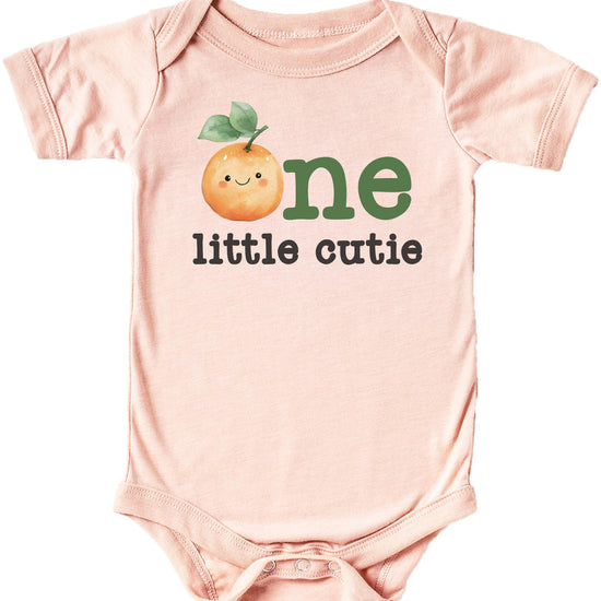 One Little Cutie birthday bodysuit and matching mommy shirt styled together for family photos