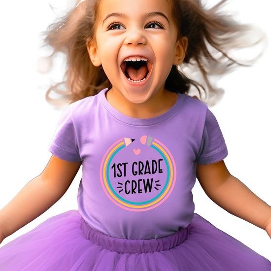 Child wearing 1st grade pencil crew shirt on first day of school