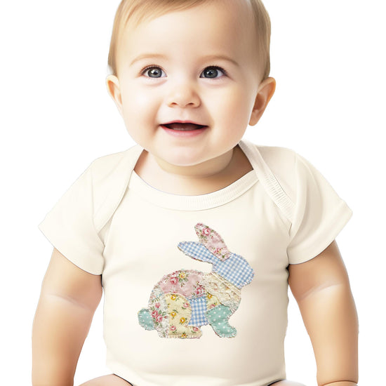 Detail shot of ink-printed faux patchwork floral bunny design on infant bodysuit