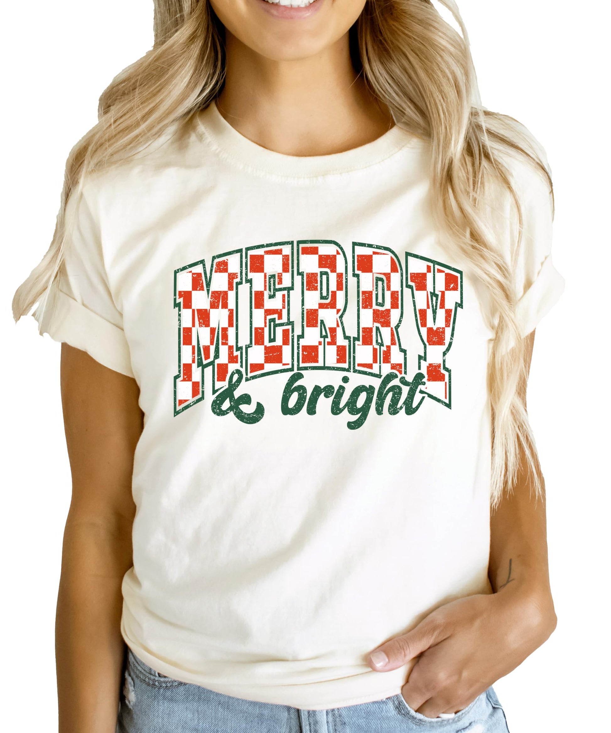 Kids wearing Merry and Bright peach Christmas graphic tee for holiday family photo