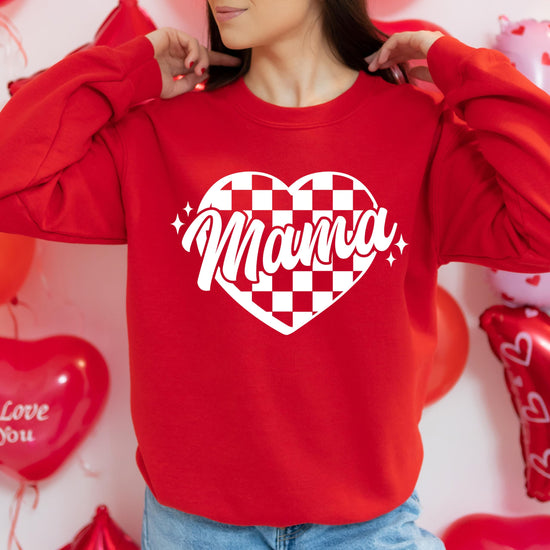 Close-up of checkered heart graphic print on red Valentine's Day sweatshirt