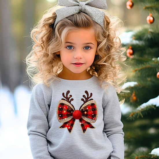 Back or side view of red and black buffalo check Christmas bow tee for women and kids