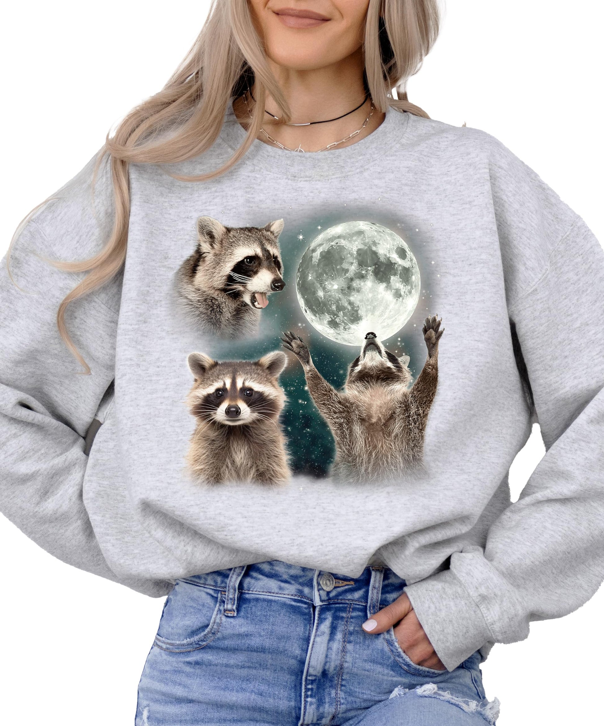 Front view of gray raccoon graphic sweatshirt showing multiple raccoon poses including moon howl