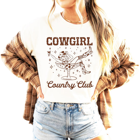 Close-up of western cocktail party graphic showing sparkles and cowboy boots detail