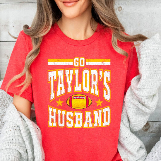 Close-up of Go Taylor's Husband lettering printed on vintage red cotton-poly blend game day shirt