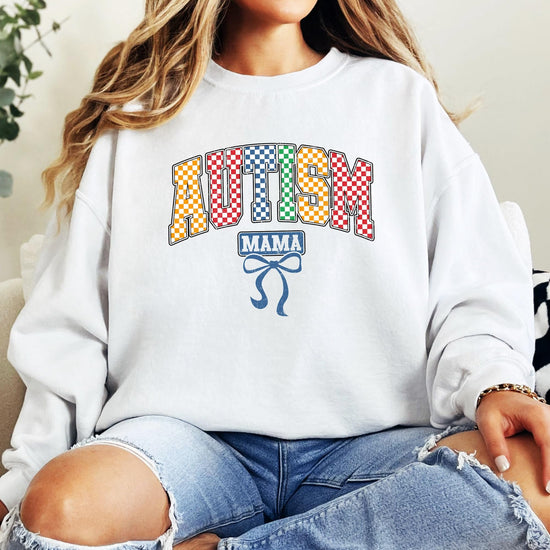 Side view of women's Autism Mama awareness pullover with multicolor graphic
