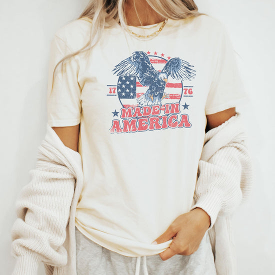 Kids and toddler sizes of the Made In America 1776 matching patriotic shirt in natural