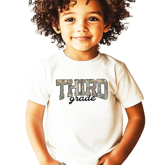 Third grade camo shirts in Natural, Pink, and Military Green laid flat — Olive Loves Apple
