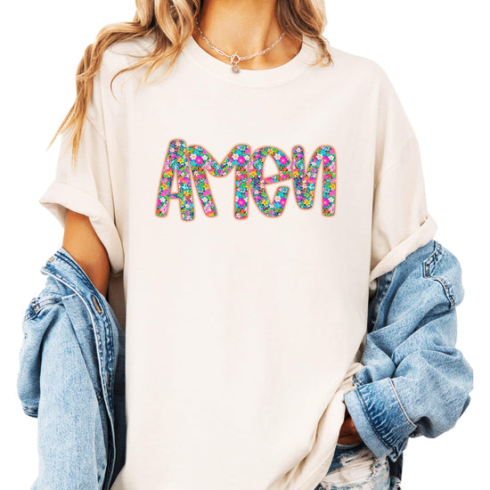 Lifestyle flat lay of women's floral Amen Easter tee showing full graphic and shirt style