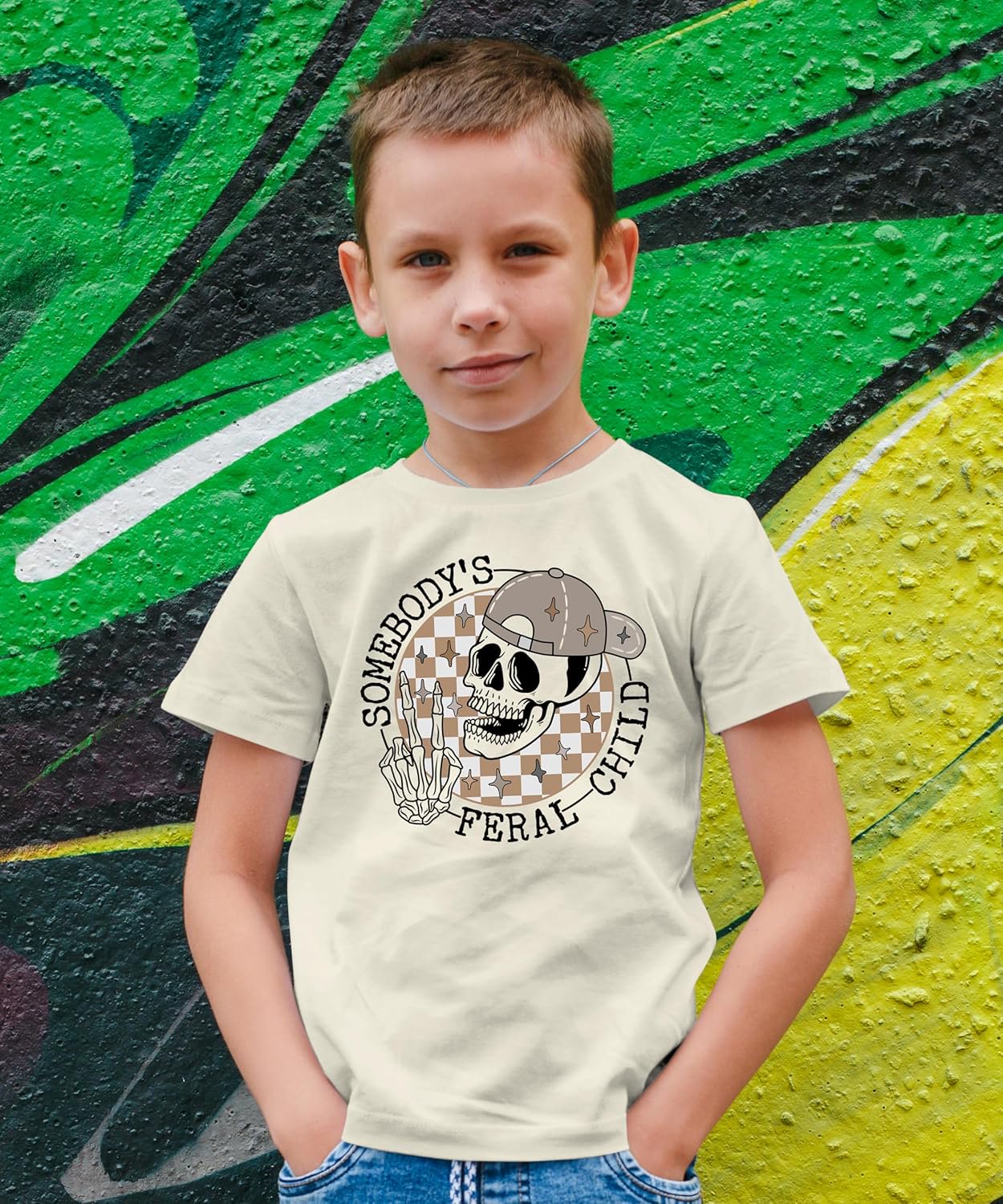 Close-up of bold retro skeleton peace sign graphic print on natural kids t-shirt