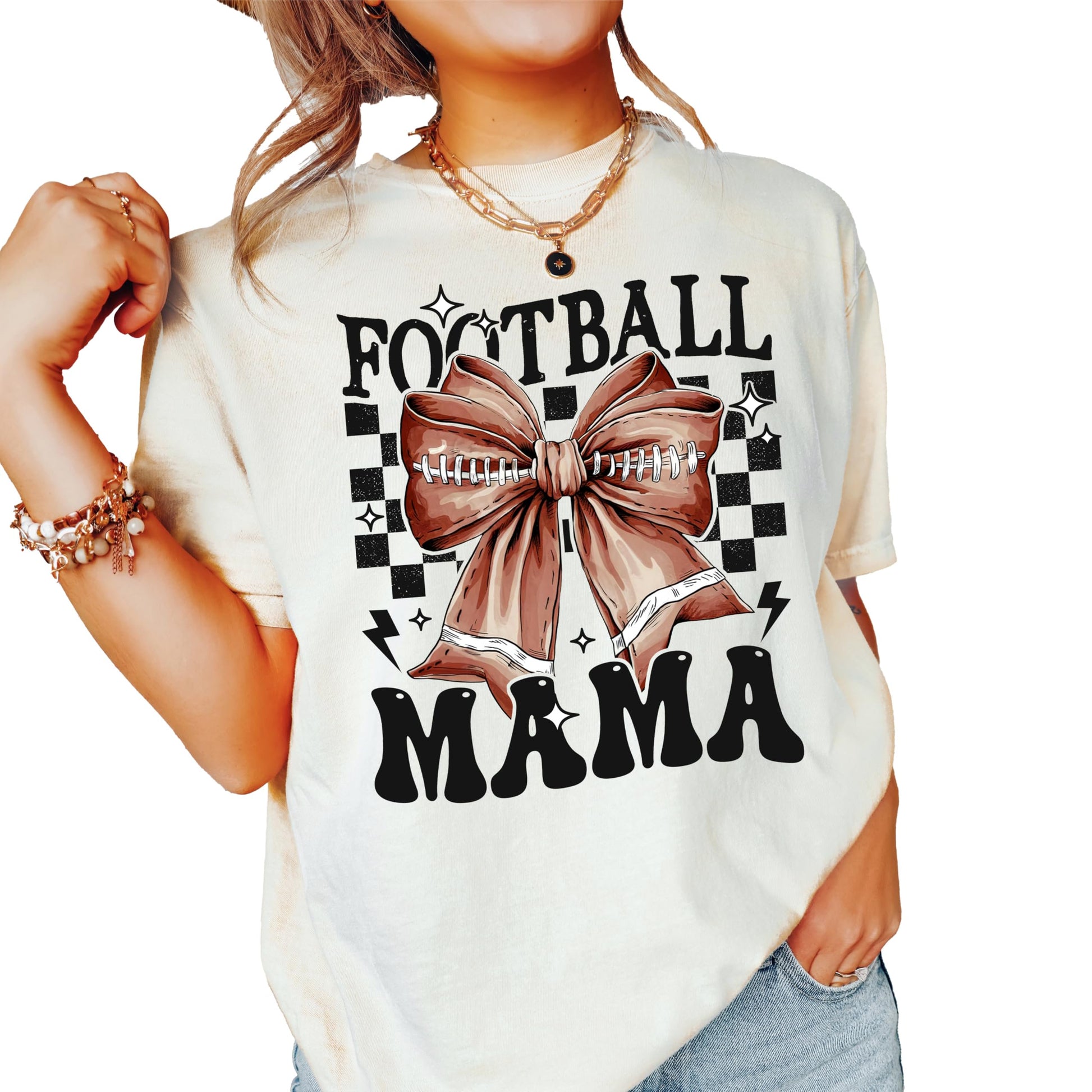 Model wearing retro Football Mama coquette bow tee in ivory, casual fall style