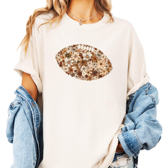 Close-up detail of colorful flower football graphic print on shirt