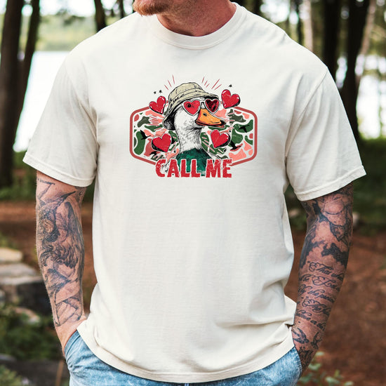 Close-up of duck hunting Valentine's Day pun graphic print on soft unisex tee