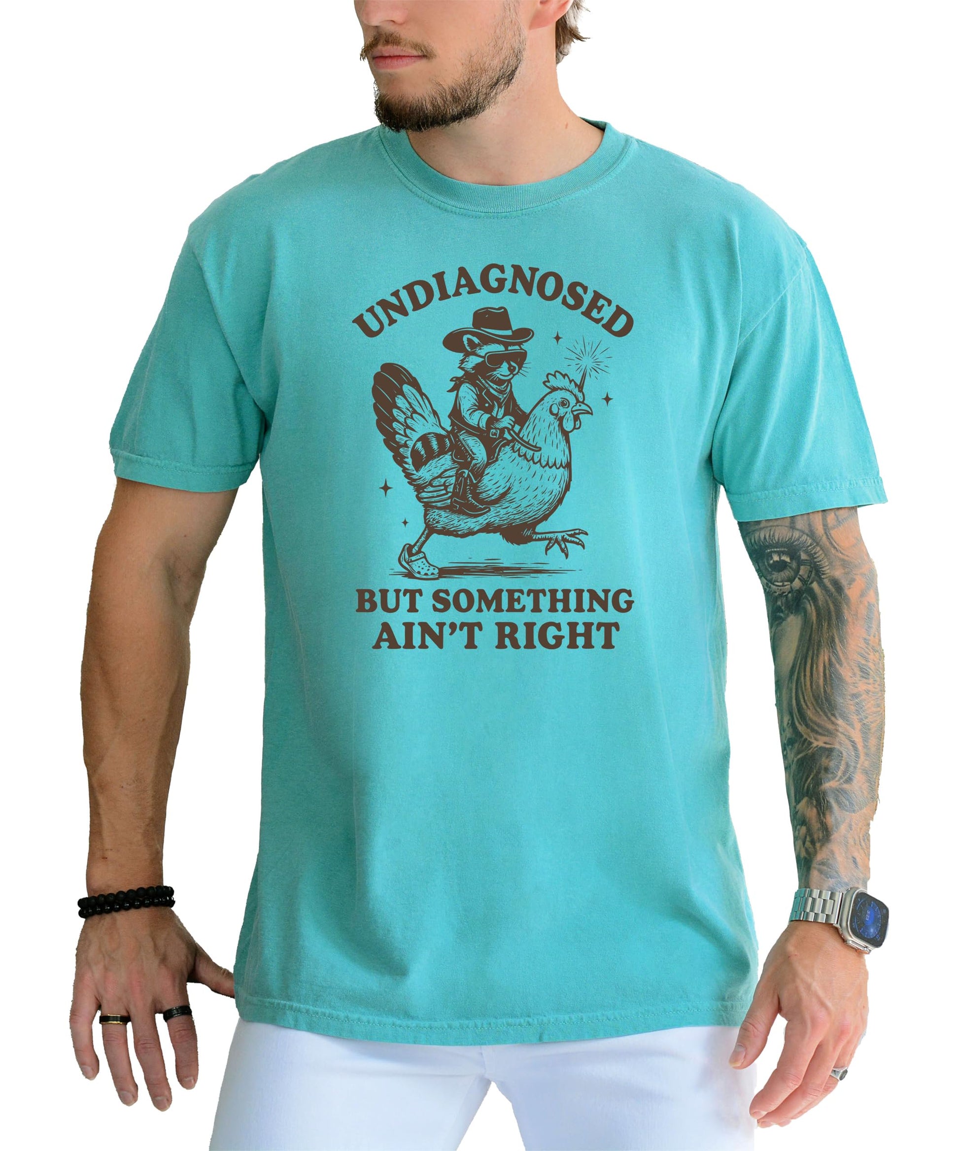 Model wearing casual blue t-shirt featuring funny raccoon with witty saying
