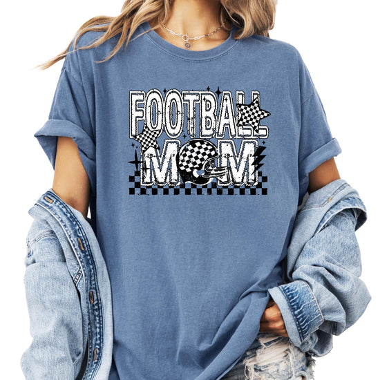 Women's Football Mom checkered stars graphic tee with bold lettering and football helmet design