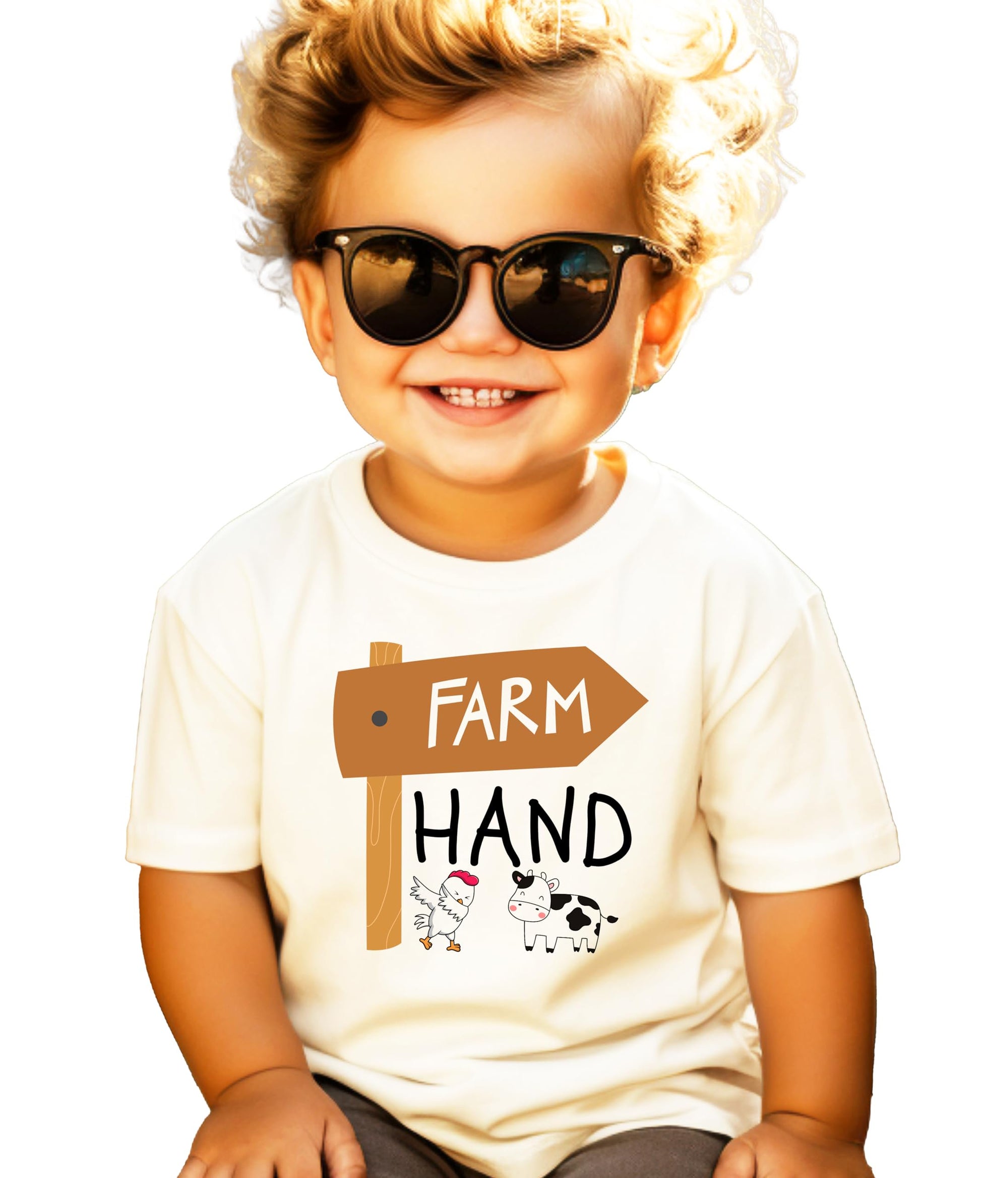 Close-up of farm hand graphic print with chicken and cow detail on kids natural shirt