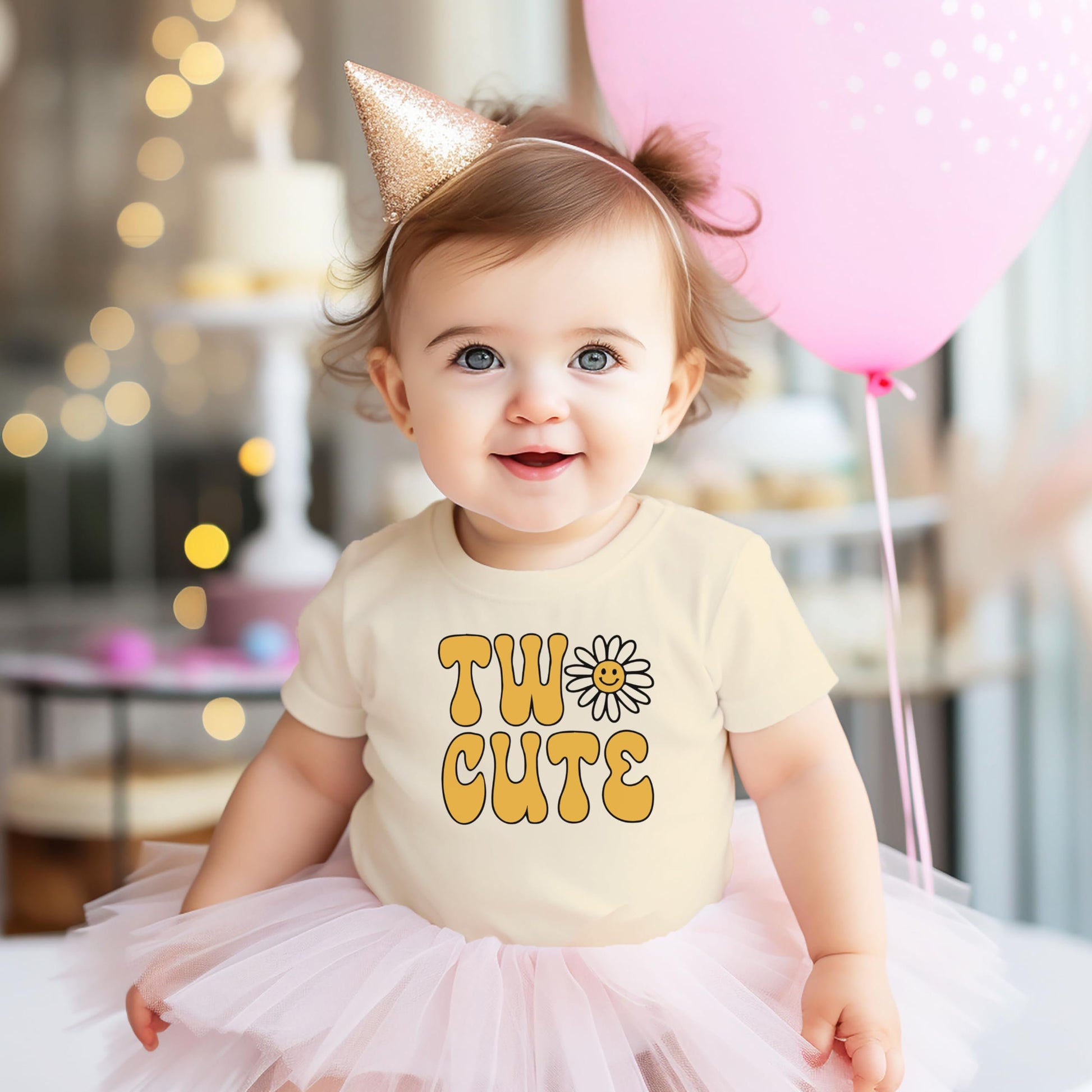 Front view of toddler Two Cute birthday tee with daisy design