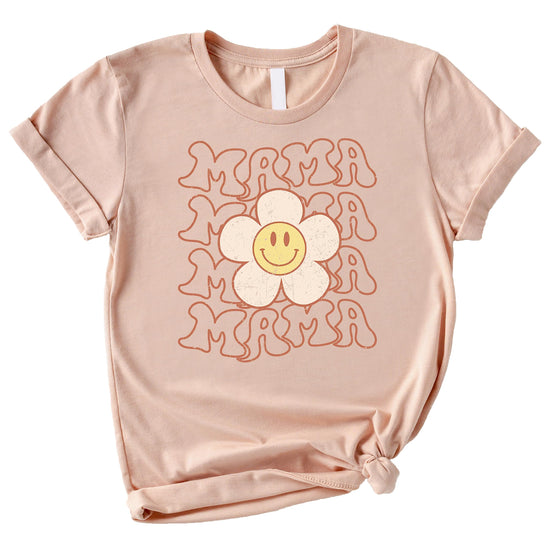 Flat lay of Happy Daisy mama and mini matching shirts in natural fabric
