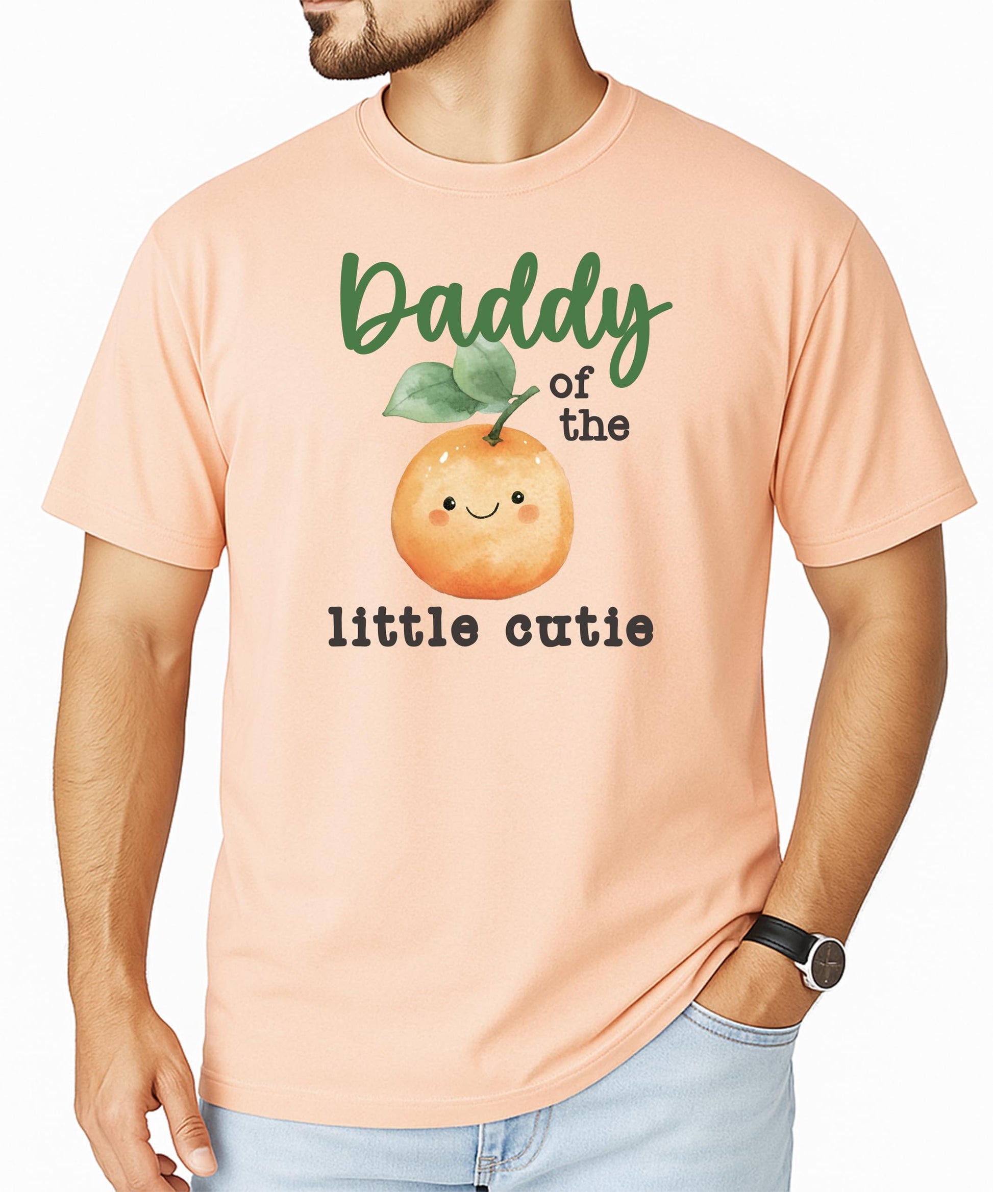 Baby wearing One Little Cutie peach orange birthday bodysuit, front view of graphic design