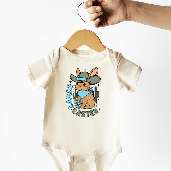 Baby bodysuit flat lay showing full Howdy Easter cowboy design