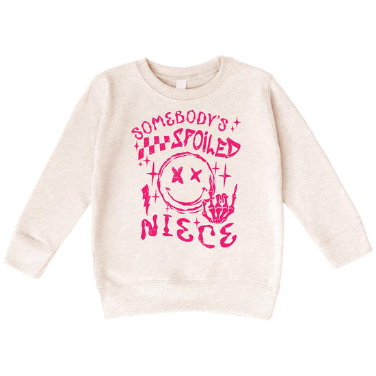 Side or detail view of Somebody's Spoiled Niece kids crewneck sweatshirt with trendy graphic