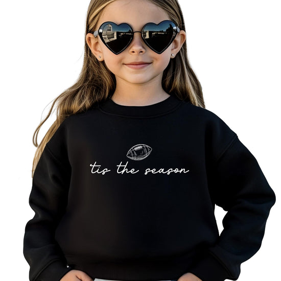 Lifestyle shot of women's football season sweatshirt perfect for tailgating and game day