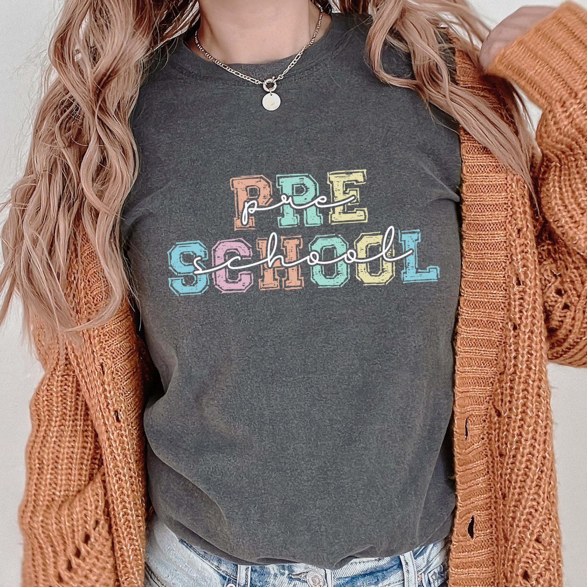 Women's preschool teacher shirt with bright colorful letters, casual relaxed fit