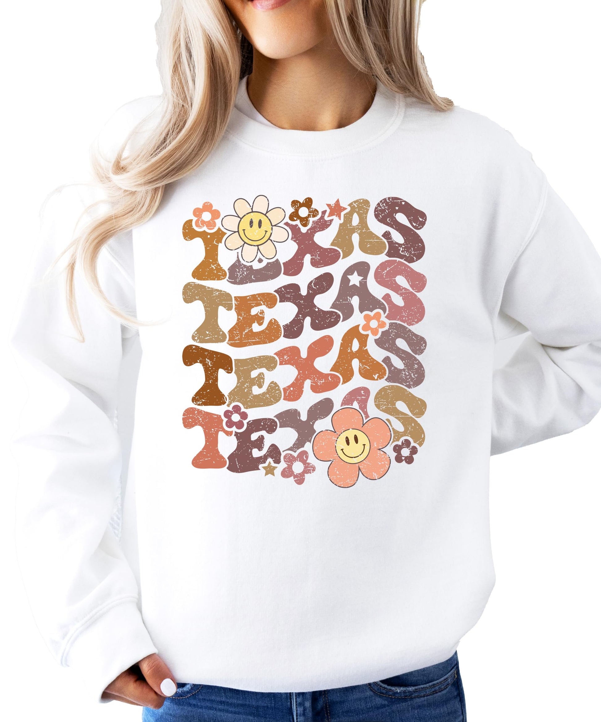 Woman wearing white Texas sports sweatshirt with colorful flower design