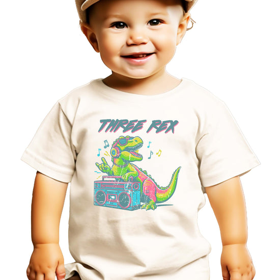 Olive Loves Apple Three Rex birthday shirt for boys laid flat showing full design