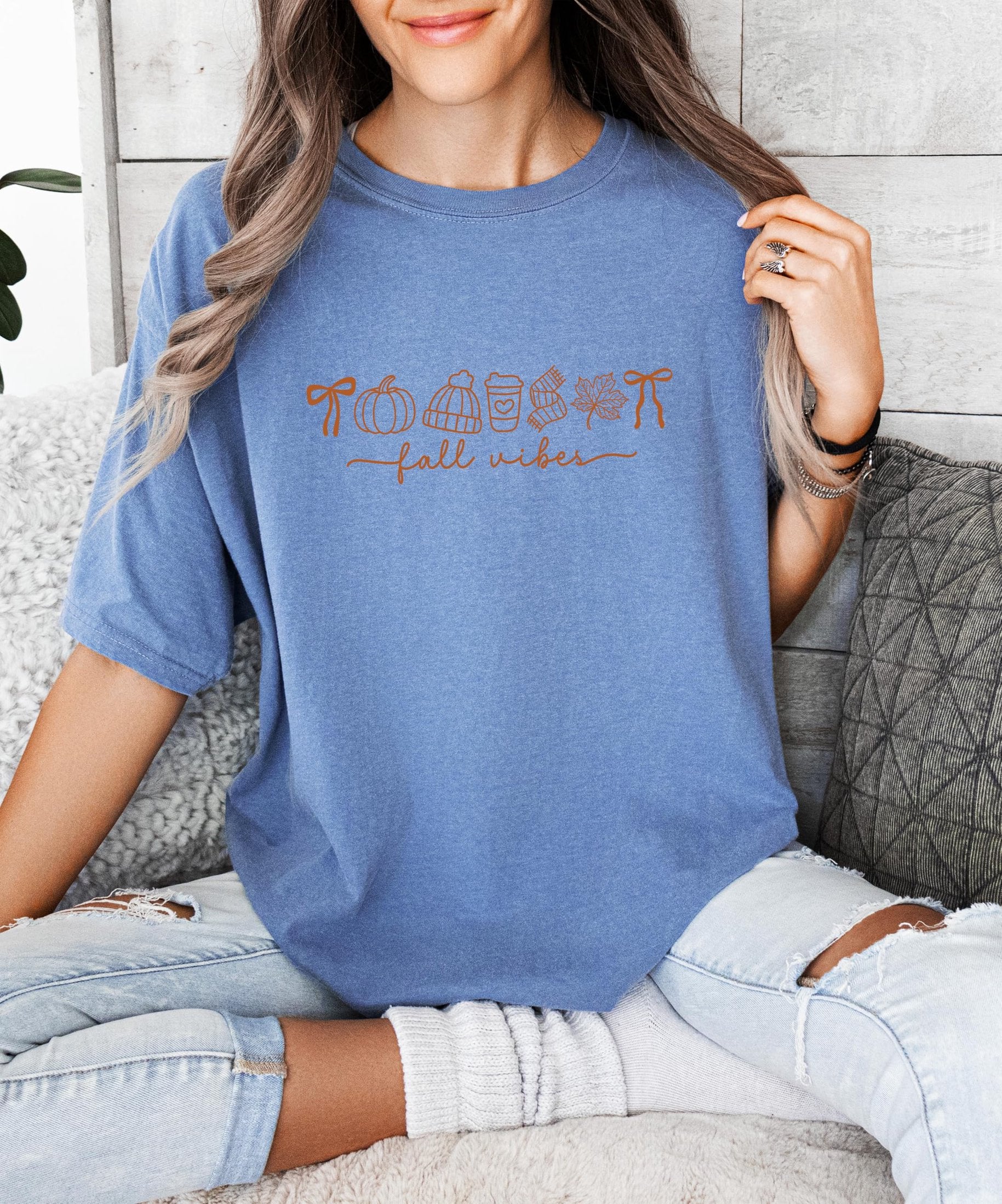 Fall Vibes women's tee flat lay showing ivory color and seasonal graphic design