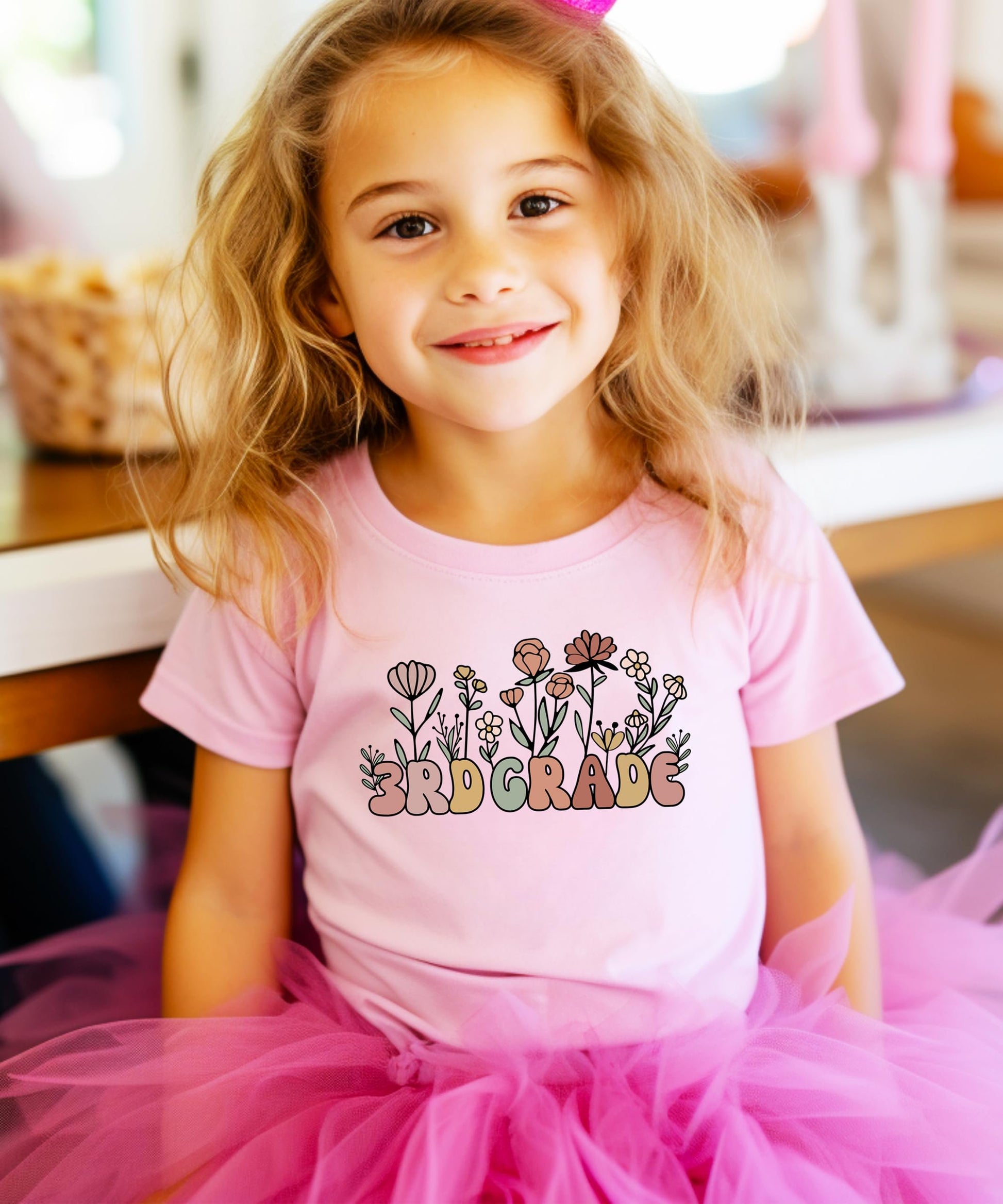 Military green youth girls 3rd grade floral tee displayed folded, showing print detail