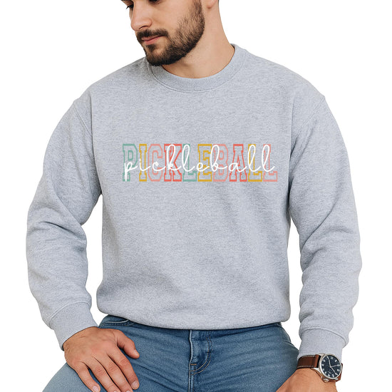 Front view of black pickleball crewneck sweatshirt with bold retro colorful graphic print