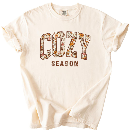 Side or angled view of Cozy Season orange floral tee for women and teens