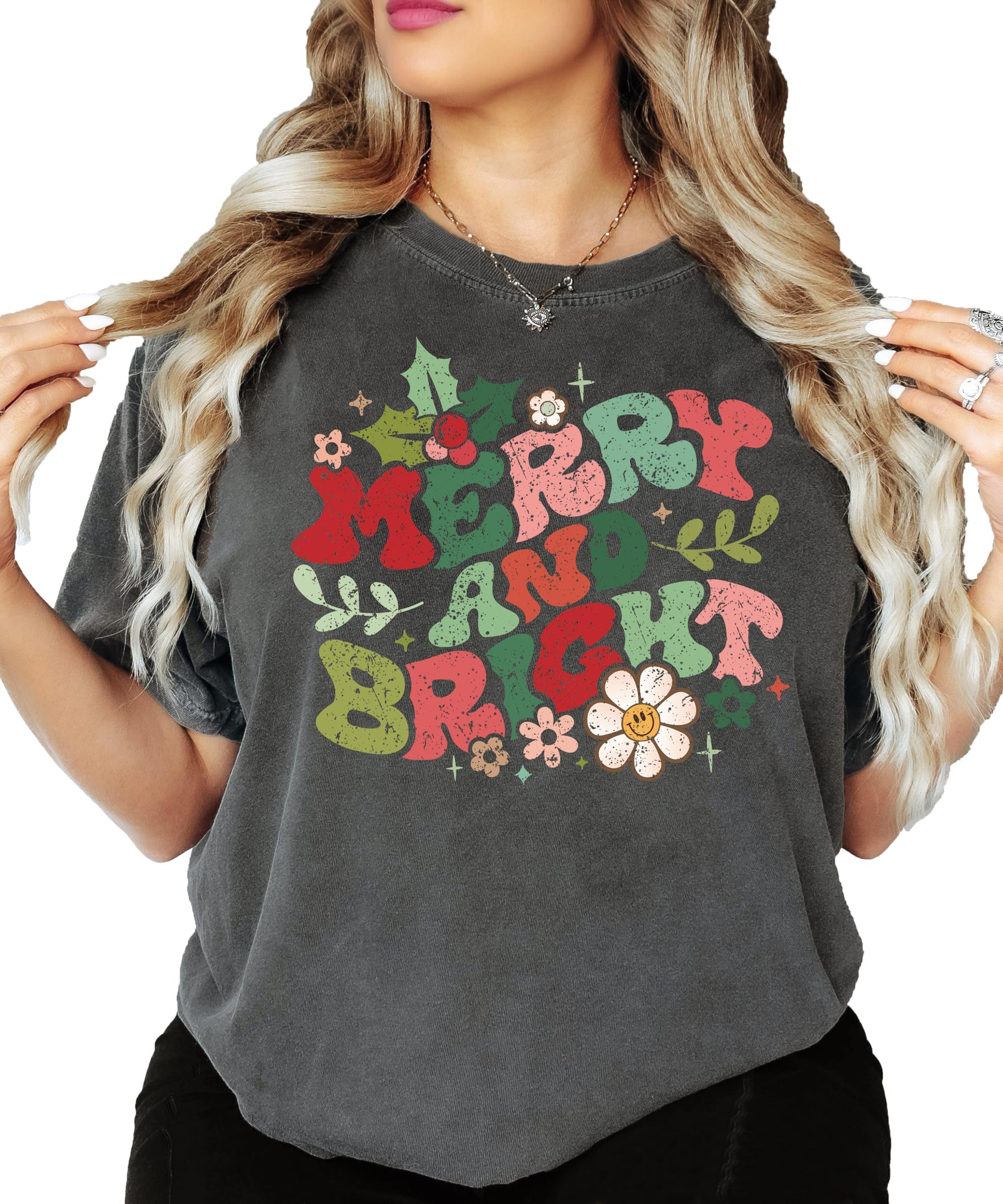 Women modeling Merry and Bright holiday graphic tee in ivory, casual festive style