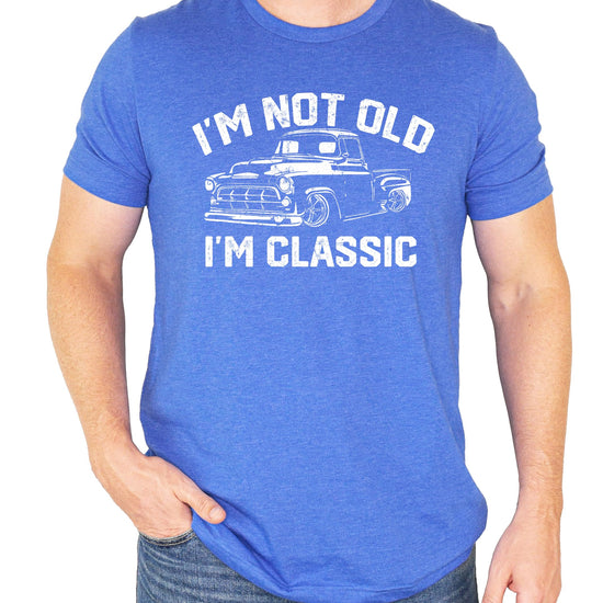 Close-up of 'I'm Not Old I'm Classic' vintage truck graphic print on black tee