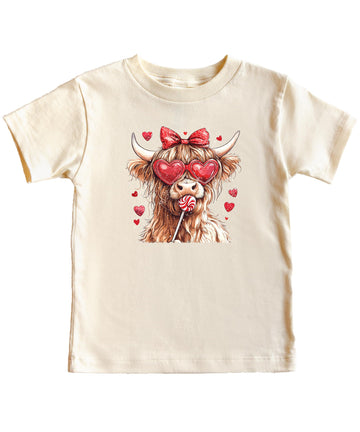 Kids' pink Highland cow Valentine's Day shirt with hearts and candy graphic print