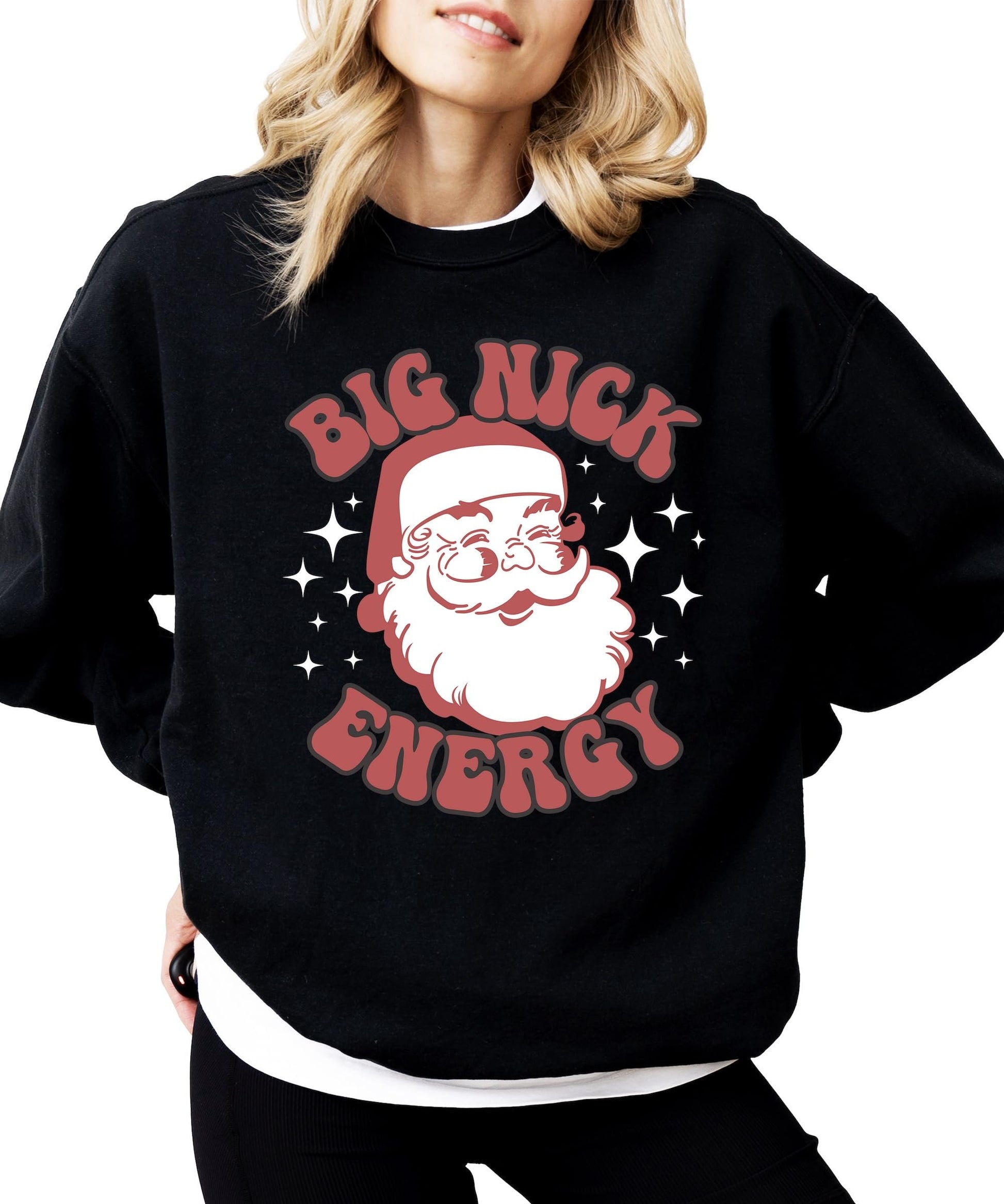 Close-up of retro Santa Big Nick Energy graphic print on black women's sweatshirt