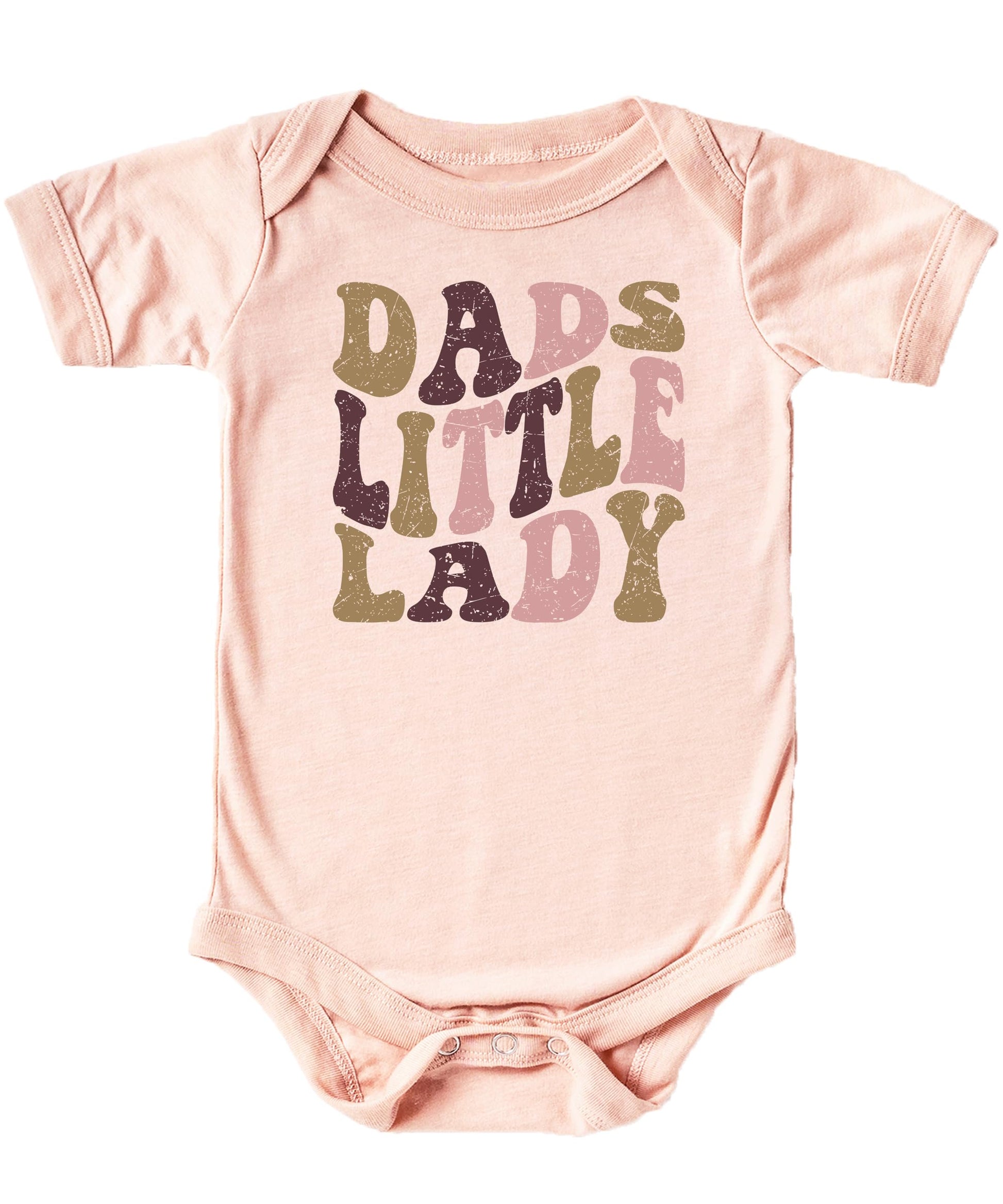 Close-up of distressed retro font Dad's Little Lady design on peach baby bodysuit