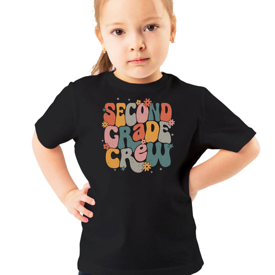 Front view of retro floral second grade school shirt in peach