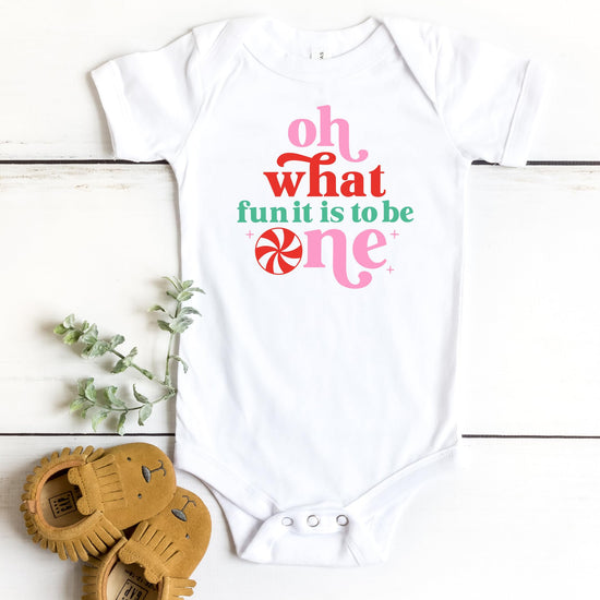 Oh What Fun It Is To Be One baby girl bodysuit styled for festive photo shoot