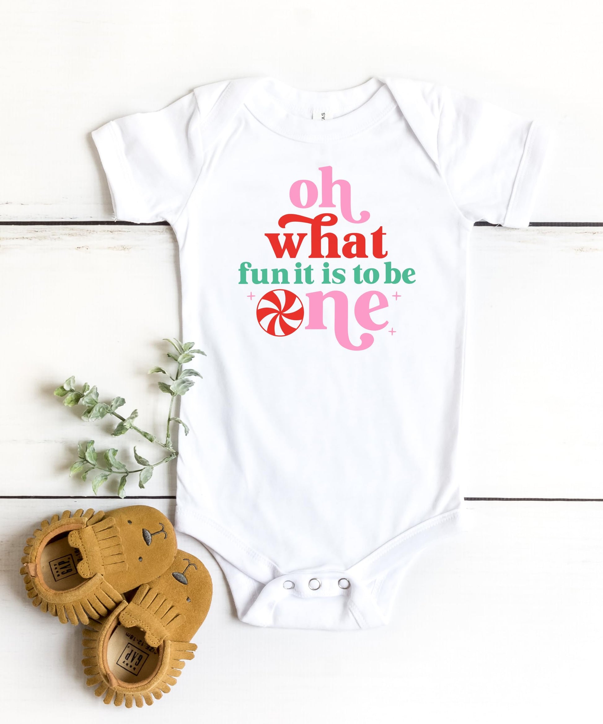 Oh What Fun It Is To Be One baby girl bodysuit styled for festive photo shoot