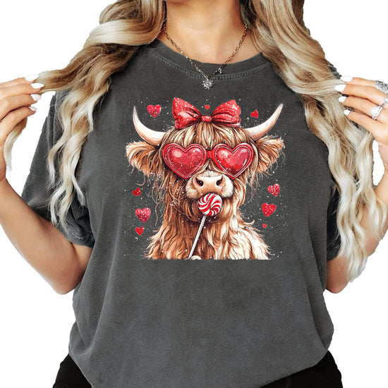 Close-up of Highland Cow Valentine's Day tee showing detailed hearts and candy print