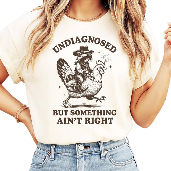 Adult wearing blue funny raccoon t-shirt with sarcastic mental health humor design