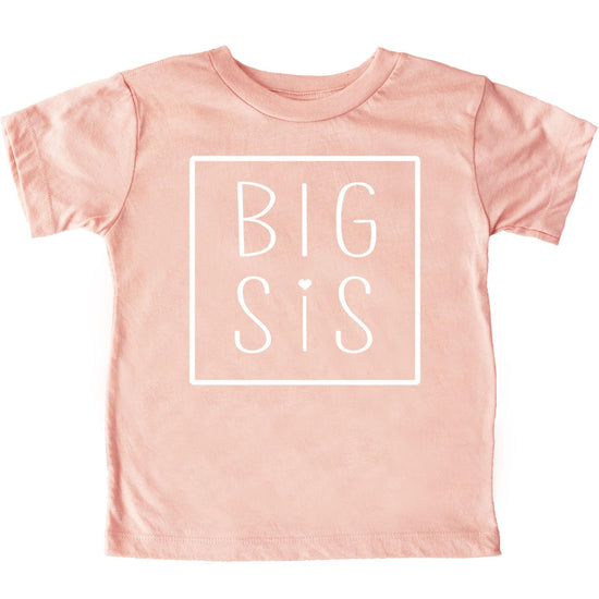 Close-up of Big Sis square design graphic on purple toddler tee for sibling reveal announcement