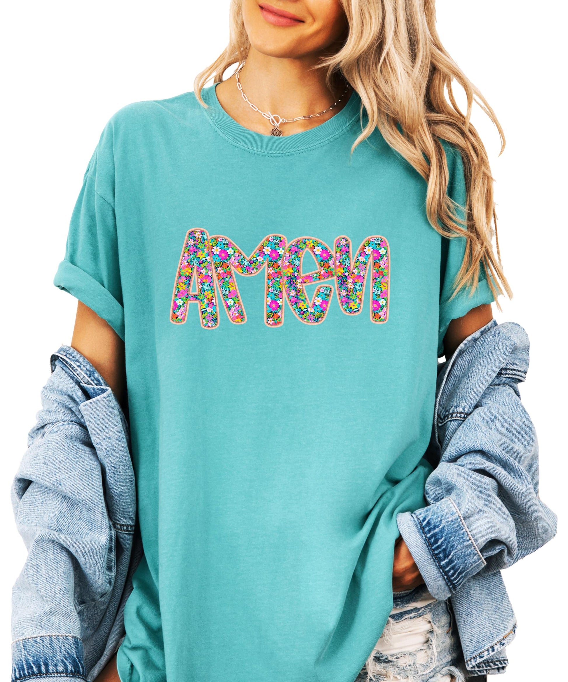 Close-up of floral Amen print on women's graphic tee showing vibrant colors and print detail