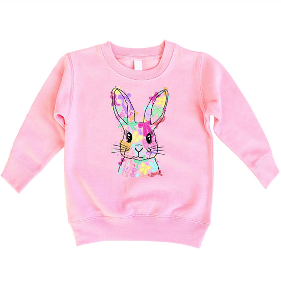 Girls white pullover sweatshirt with colorful Easter Bunny and coquette bow graphic design