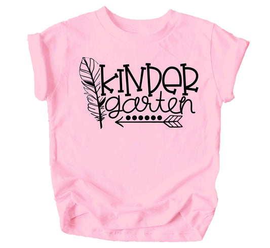 Toddler girl wearing a pink Kindergarten Squad boho graphic tee for first day of school