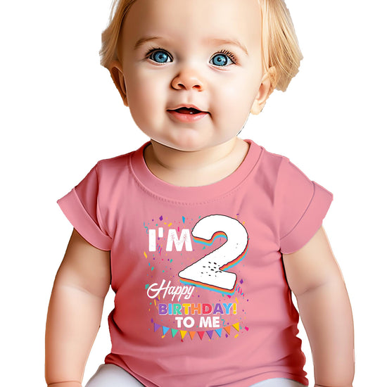 Toddler wearing an 'I'm 2 Happy Birthday to Me' graphic tee with colorful confetti and bold lettering
