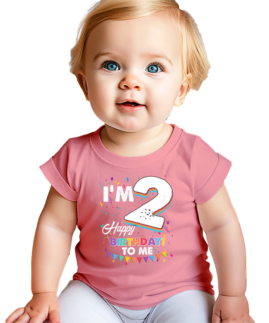 Toddler wearing an 'I'm 2 Happy Birthday to Me' graphic tee with colorful confetti and bold lettering