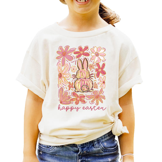 Toddler girl wearing a peach Happy Easter flower bunny graphic tee — Olive Loves Apple